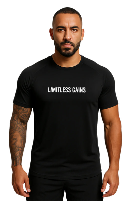 Man wearing a black t-shirt with 'LIMITLESS GAINS' text on a white background