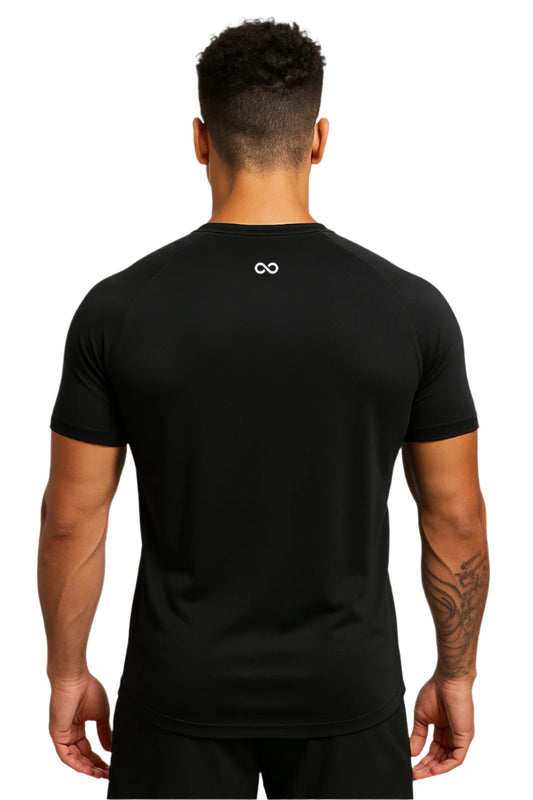 Person wearing a black t-shirt with a logo on the back against a white background