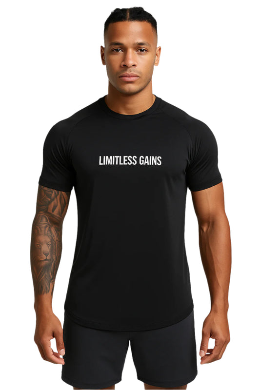 Man wearing a black t-shirt with 'LIMITLESS GAINS' text on a white background