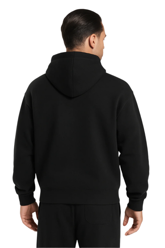Person wearing a black hoodie from behind on a white background