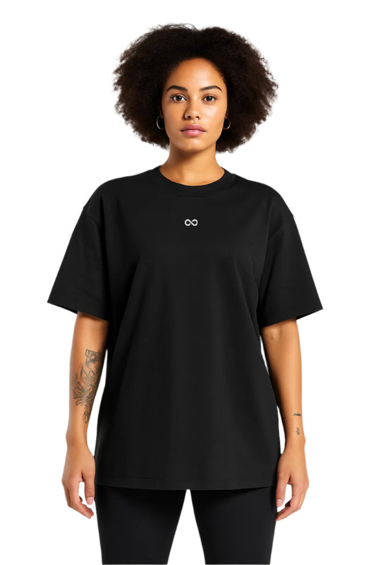 Person wearing a black t-shirt with a logo on a white background