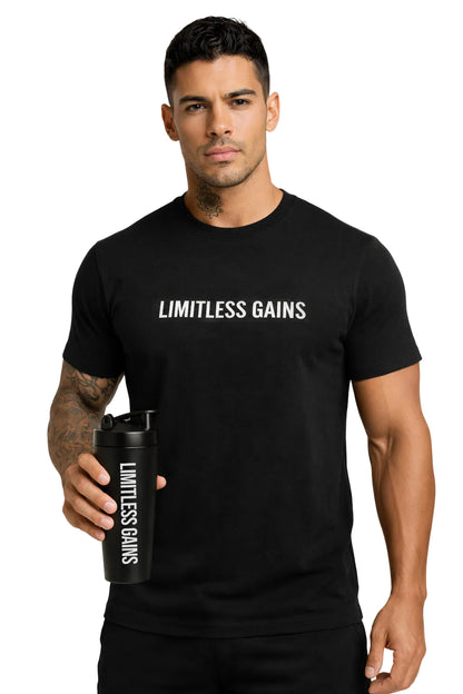 Man wearing a black 'Limitless Gains' t-shirt holding a matching cup.