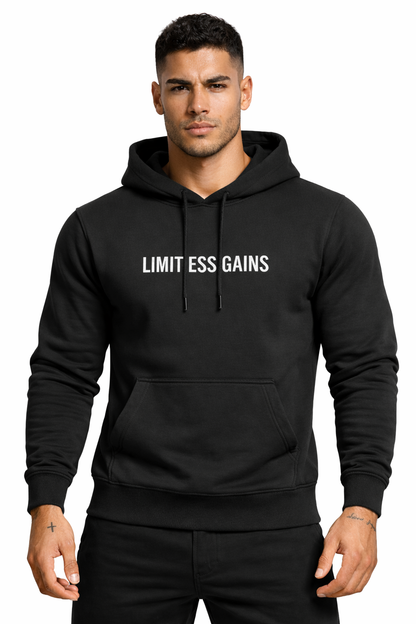 Man wearing a black hoodie with 'LIMITESS GAINS' text on a white background