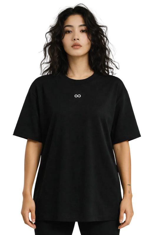 Person wearing a black t-shirt with a logo on a white background