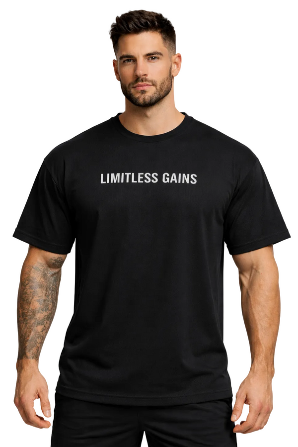 Man wearing a black t-shirt with 'LIMITLESS GAINS' text on a white background