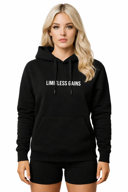 Woman wearing a black hoodie with 'Limitless Gains' text on a white background