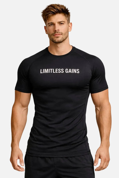 Man wearing a black t-shirt with 'LIMITLESS GAINS' text on a white background